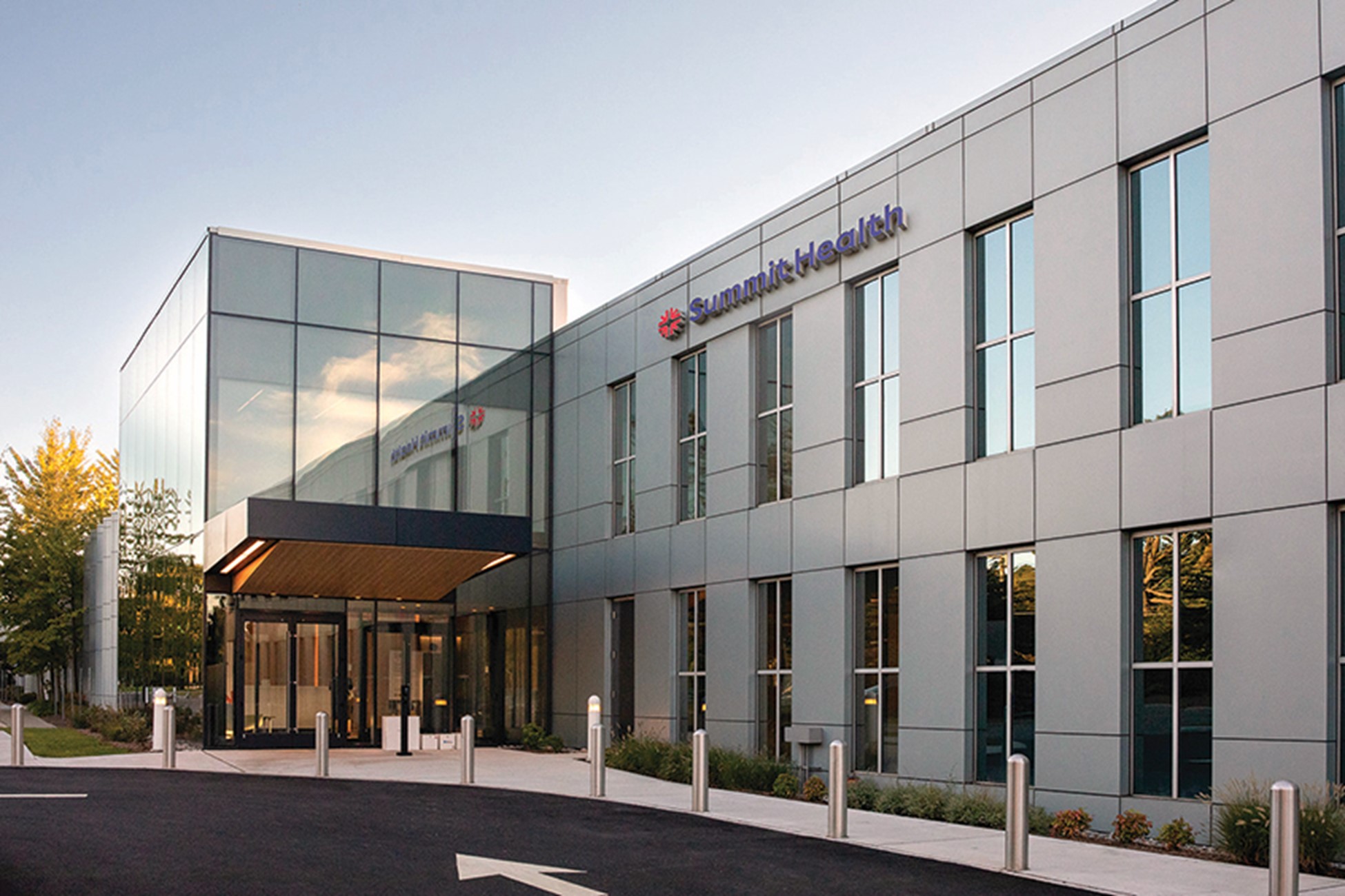 Exterior view of Summit Health’s Clifton, NJ location at 1255 Broad Street, showing the main entrance walkway